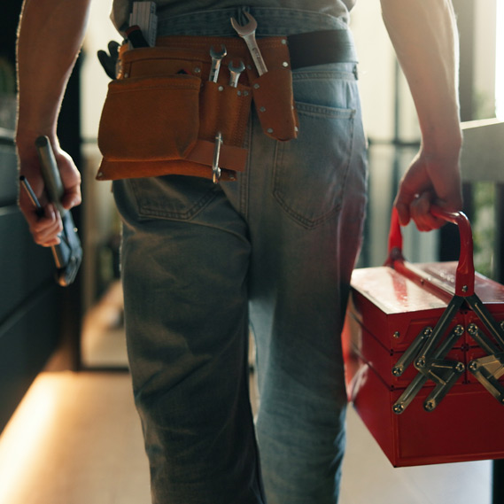 Emergency plumber getting ready to work